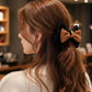 Elegantes elastisches Haargummi mit Schleife